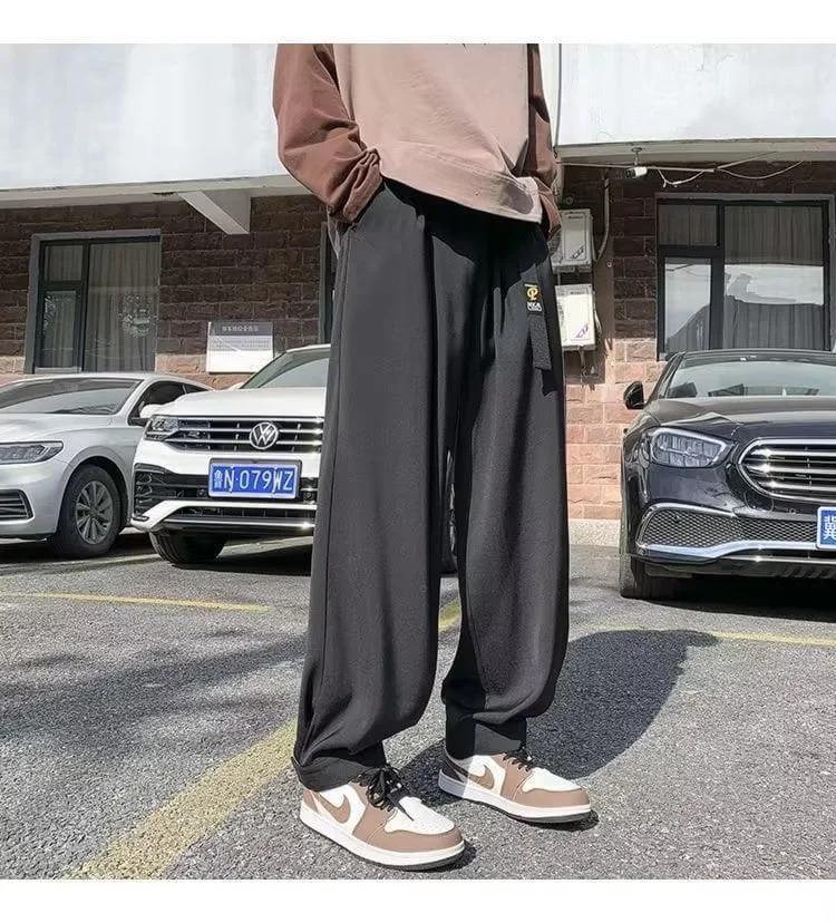 Men’s casual track pants in black with drawstring waist
