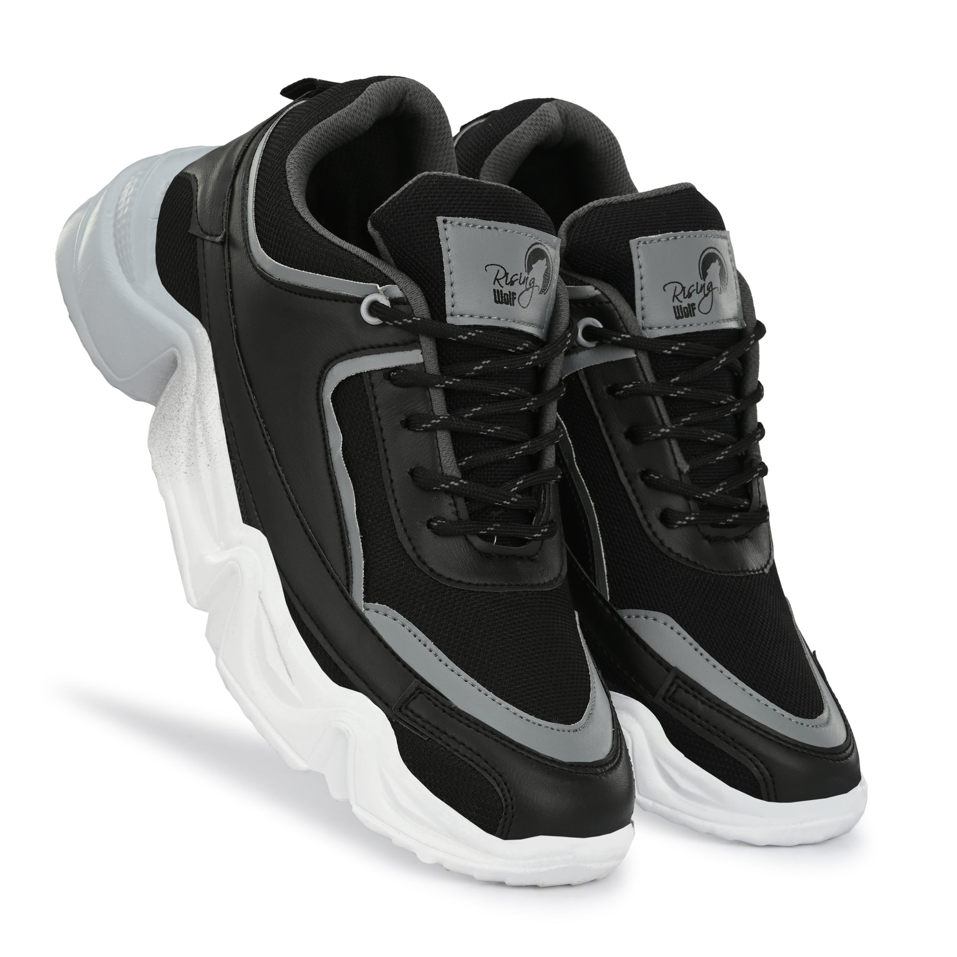 men's chunky sneakers in black and grey with a thick white sculpted wavy sole