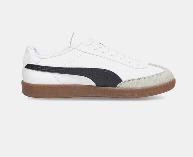 white men's sneaker featuring a signature black side stripe, a grey suede T-toe overlay, and a vintage-style gum rubber sole.