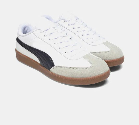 white men's sneaker featuring a signature black side stripe, a grey suede T-toe overlay, and a vintage-style gum rubber sole.
