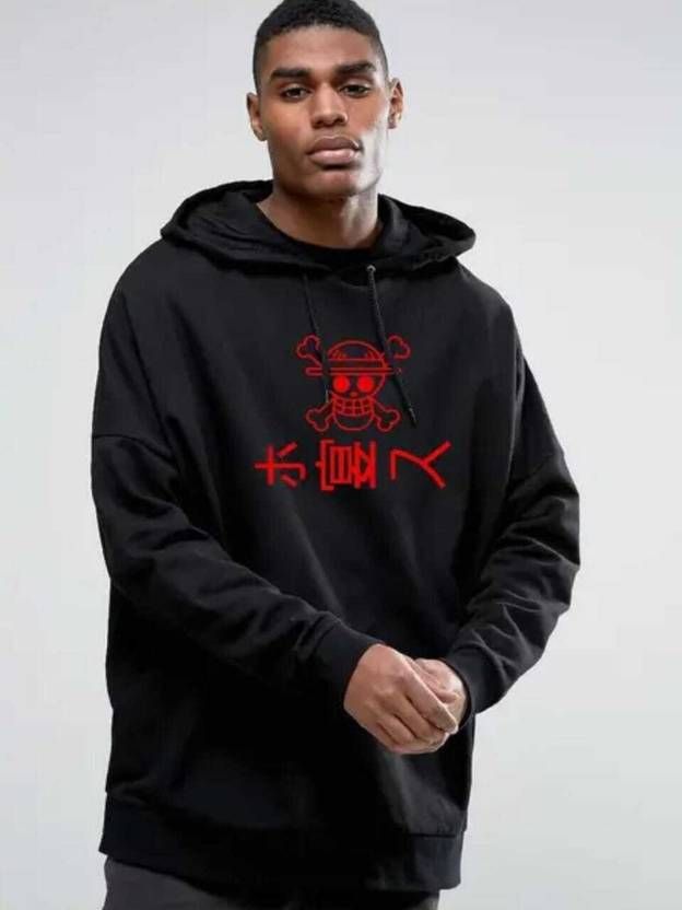 A black oversized hoodie with a red One Piece anime skull and crossbones graphic on the chest