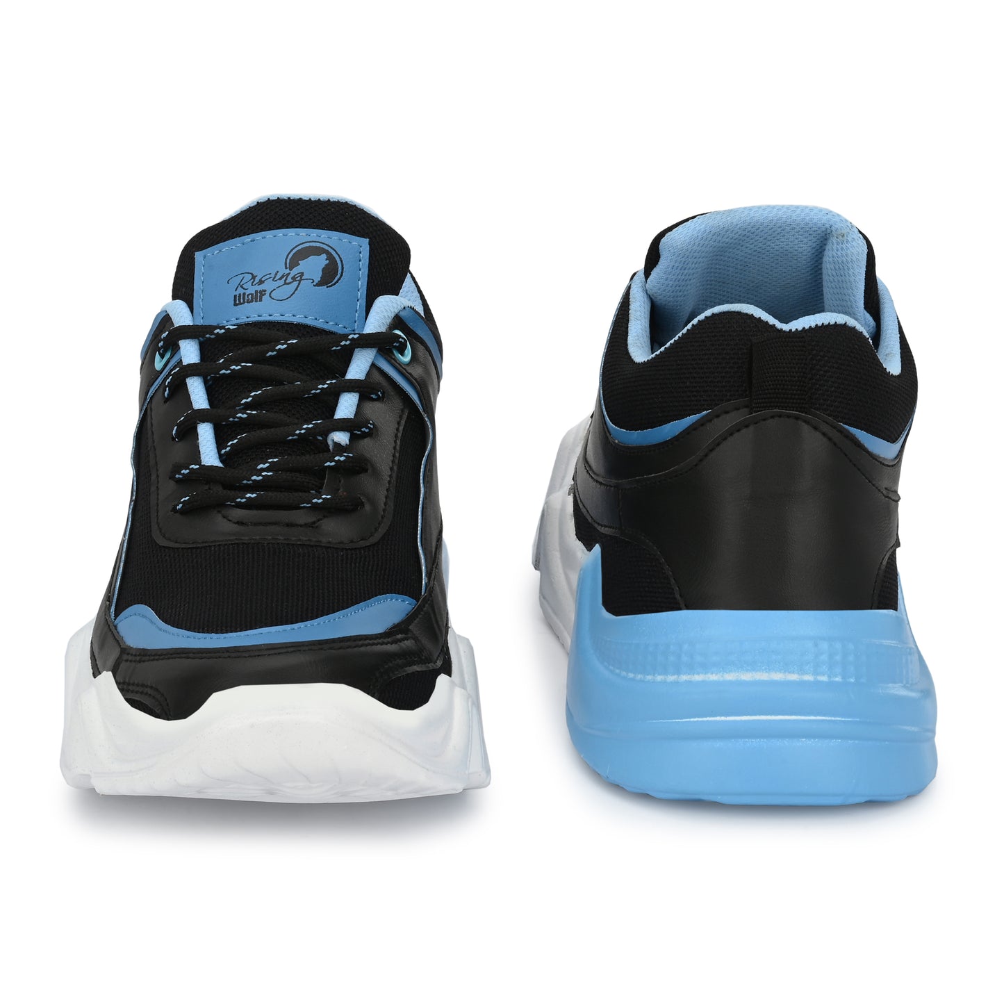 men's blue and black chunky sneakers with a white wavy sole, styled with dark blue denim jeans on a tiled staircase.
