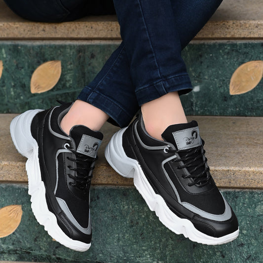 men's chunky sneakers in black and grey with a thick white sculpted wavy sole