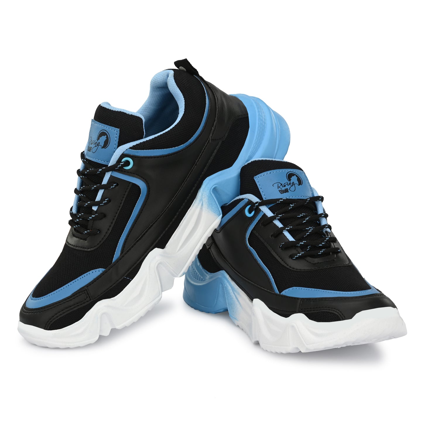 men's blue and black chunky sneakers with a white wavy sole, styled with dark blue denim jeans on a tiled staircase.