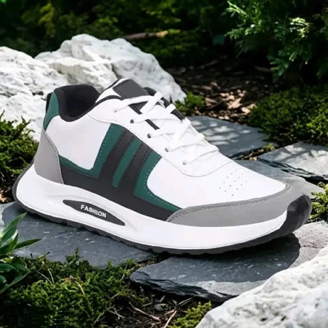 A premium white men's sports sneaker with dark green and grey accents, featuring a thick cushioned sole