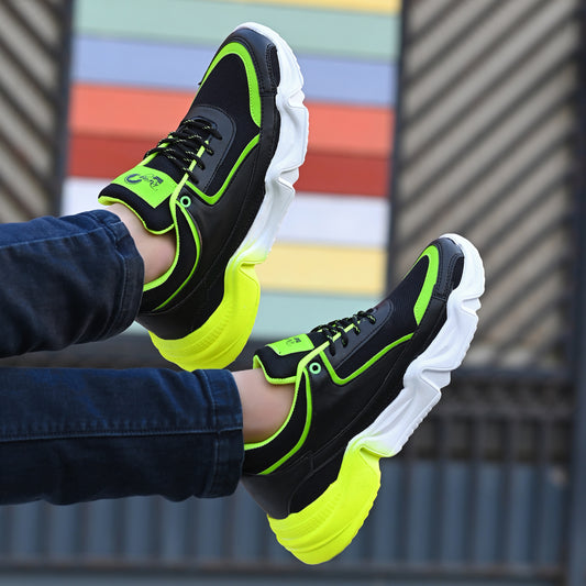 neon green and black chunky sport sneakers with a white and yellow gradient wavy sole