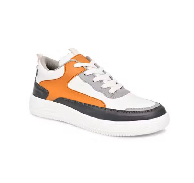 Men's multi-colour sneakers featuring white, tan, and grey patchwork panels with a thick white textured 'AIR' sole and white laces