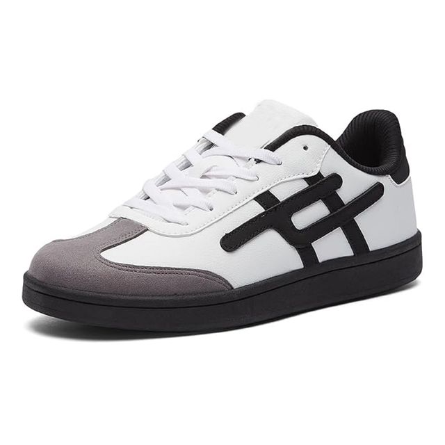 Men's low-top white sneakers featuring a grey suede toe cap, black side stripes, and a solid black flat rubber sole