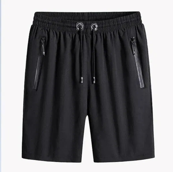 A set of four men's athletic shorts in charcoal, silver, black, and navy blue, showcasing elastic waistbands, drawstrings, and vertical zipper side pockets.