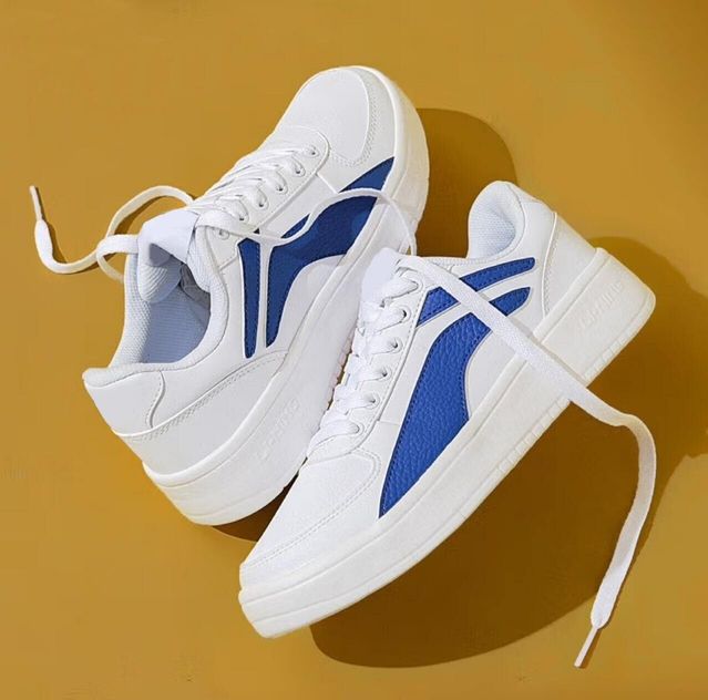 men's white chunky sneakers with blue side stripes and white laces