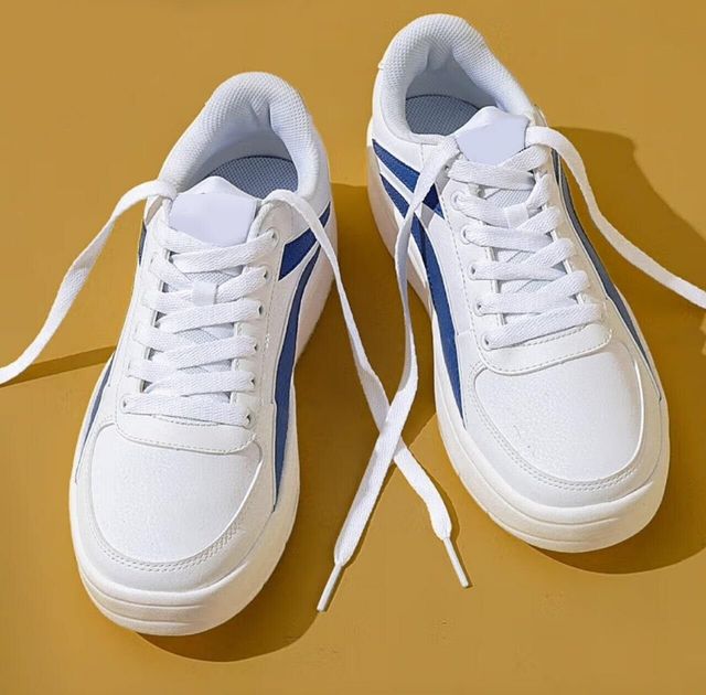 men's white chunky sneakers with blue side stripes and white laces