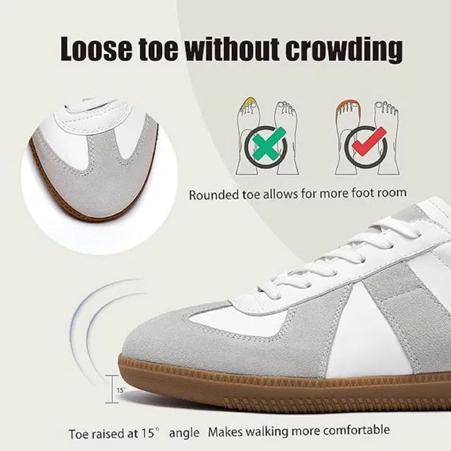 White leather German Army Trainer style sneakers with light grey suede overlays and a gum rubber sole.